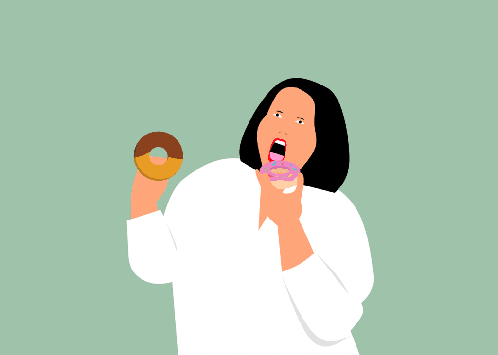 Woman about to overeat two doughnuts